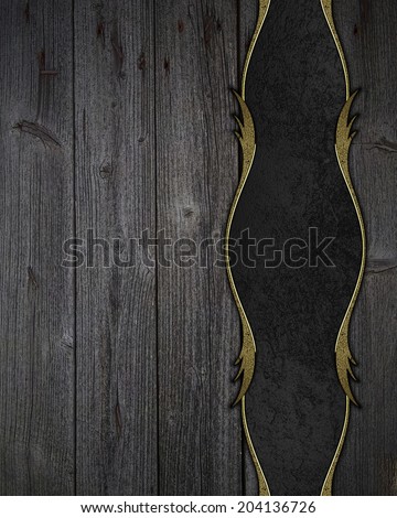 Old wooden background with black ribbon with gold trim. Design template. Design site
