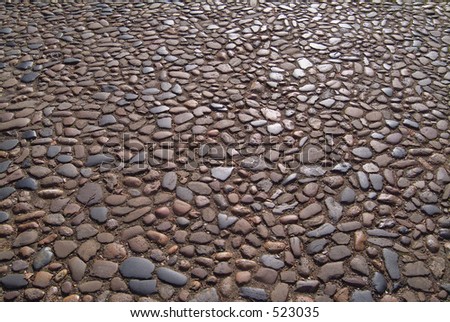 Ancient cobbles in an English city worn by time