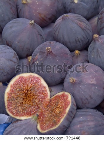 Group of figs, one halved.