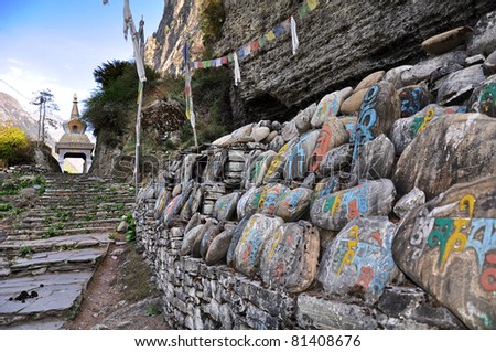 Holy stones with written colorful mantra , Nepal