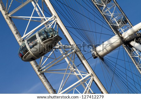 LONDON - NOV 30: The London Eye on November 30, 2012 in London. The entire structure of the London Eye is 135 meters tall and the wheel has a diameter of 120 meters.