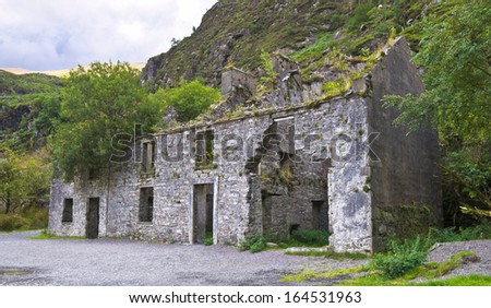Old building on the road through the Gap of Dunloe, Killarney, Ireland. Historically this was built in the nineteenth century as a police barracks but is now an overgrown ruin.