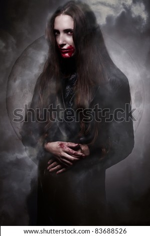 Shot of Vampire Girl in the moonlight and mist