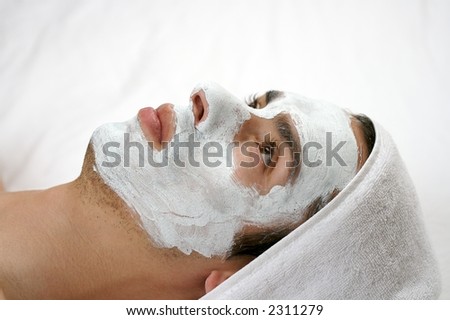 someone having a cleansing mask
