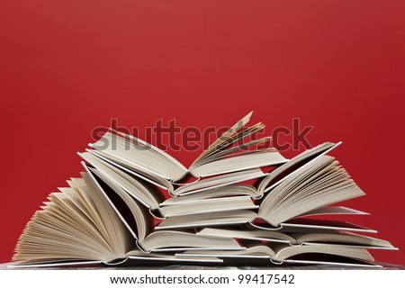 A group of books on red background