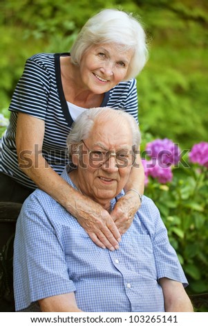 Happy senior couple in the garden