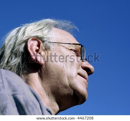 Man profile on blue sky