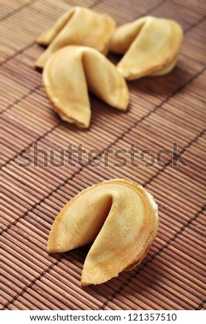 Some Fortune Cookies on bamboo place-mat