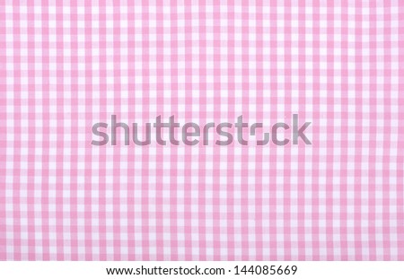 Light pink checkered fabric closeup , tablecloth texture