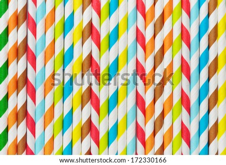 Background of Striped  drink straws in different colors