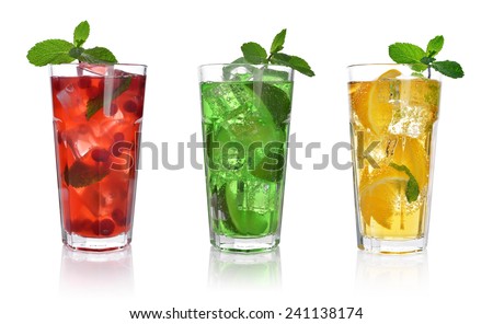Red berry cocktail drink with cranberry and ice isolated on white