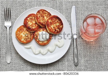 cottage cheese pancakes with a cold drink