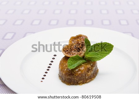 Sweet dessert made of fruit and nuts with honey and figs