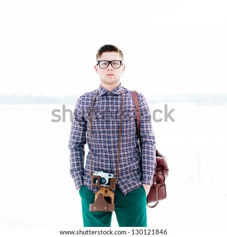 trendy hipster guy with a camera