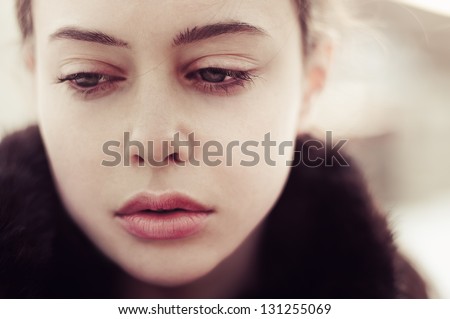 Portrait Of A Beautiful Sad Girl Closeup