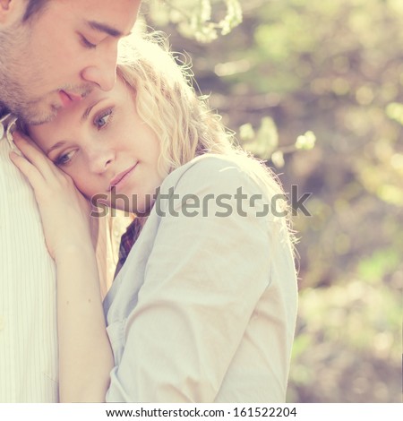 beautiful couple in love tenderly embraces