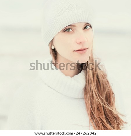 portrait of a beautiful girl in winter hat