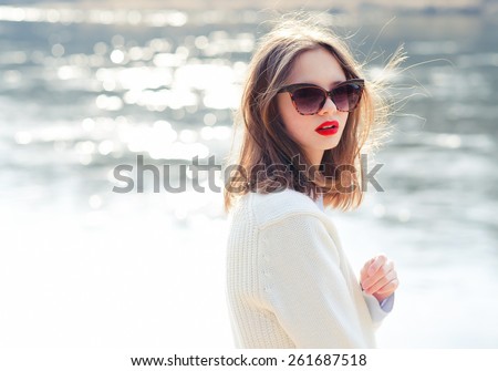 fashion girl in sunglasses. vacation at sea