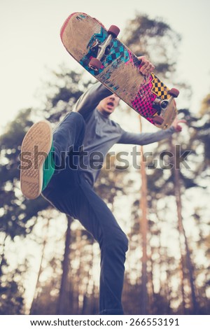 skater guy jumps
