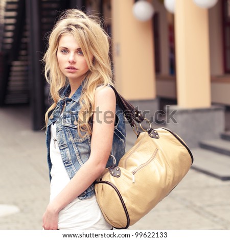 beautiful girl with a bag