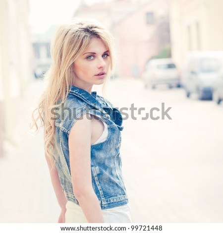Portrait of a beautiful blonde on the street