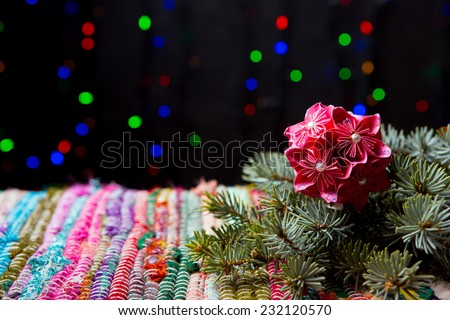 Traditional handmade decoration, spruce and striped textile