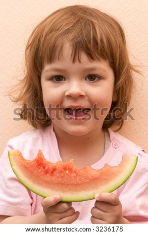 taste of summer - little cute girl eating water melon