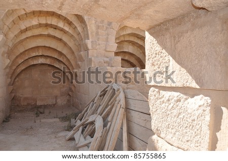 An old Roman store and wooden arches