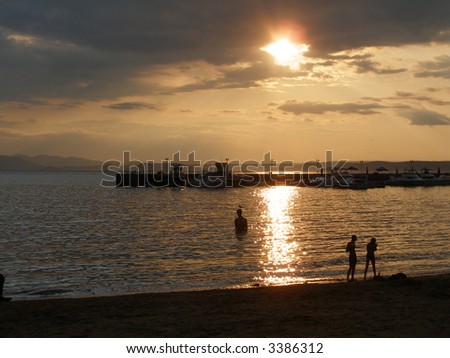 Sunset, city, swimmers