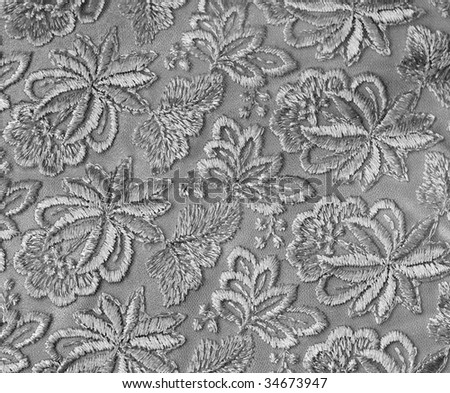 stock photo Silver guipure embroidery on cloth for wedding dress texture