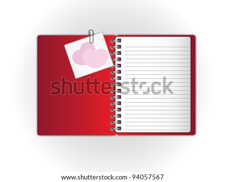 New open page Red notebook holding sweet card by paper clip.