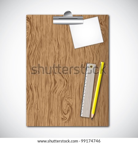 Paper pad on wooden clipboard with tools , pencil and ruler.