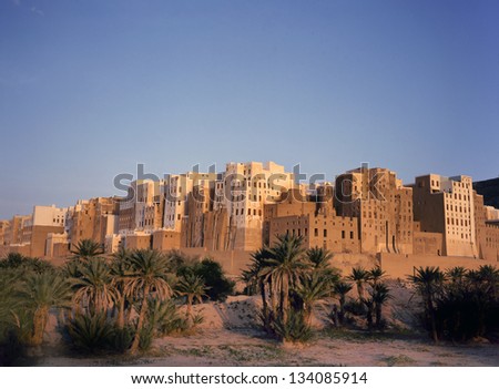 Magnificent sunrise at the skyscrapers of the city of  Shibam in Yemen. This city is situated in the middle of the Hadramaut valley, which is an UNESCO World Heritage site.
