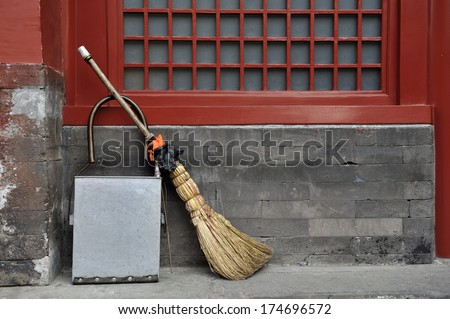 Broom and waste basket in the Forbidden City of Beijing,China