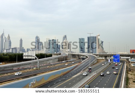 DUBAI UNITED EMIRATES - FEBRUARY 9, 2014: Traffic on highway Sheikh Zayed Road leading to the city center. February 9, 2014 Dubai, United Arab Emirates