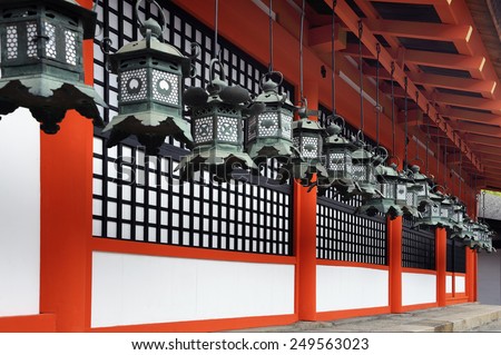 NARA, JAPAN-NOVEMBER 6, 2014;Kasuga Taisha Shrine is famous for its lanterns Hundreds of bronze lanterns are hanging from the buildings.It is an UNESCO World Heritage site.November 6, 2014 Nara,Japan