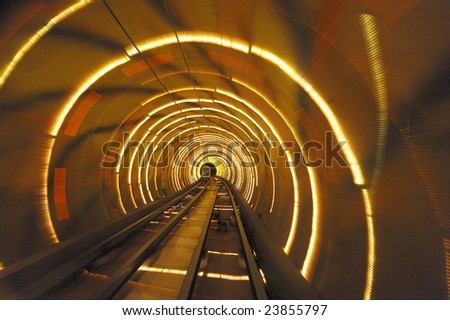 Bund Tourist Tunnel Shanghai is  a sightseeing tunnel under the Huangpu river. The tunnel stretches over an area of 646.7 meter, it is the first cross-river artificial sightseeing tunnel of China.