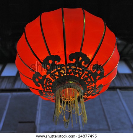 Old red Chinese lantern at night