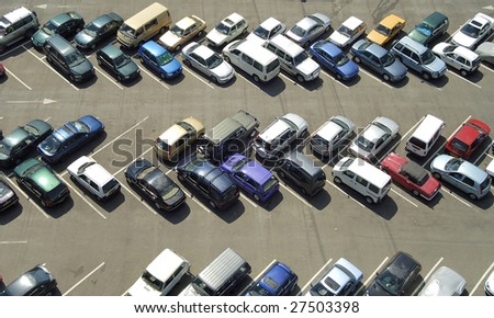 Car parking seen from above in bird view
