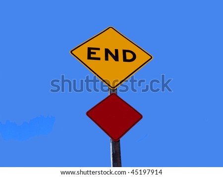 Traffic signs indicating the end of a road of a dead end street . Against clear blue sky.