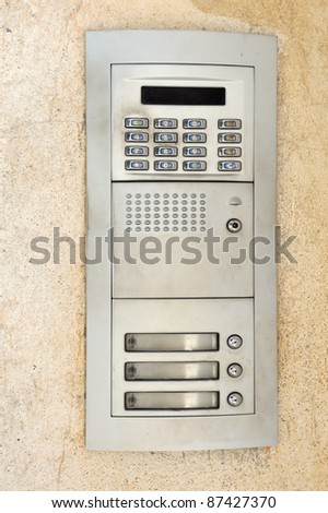 Apartment buzzers with push buttons and intercom
