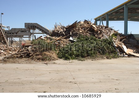 Piles of yard waste at a green recycling center
