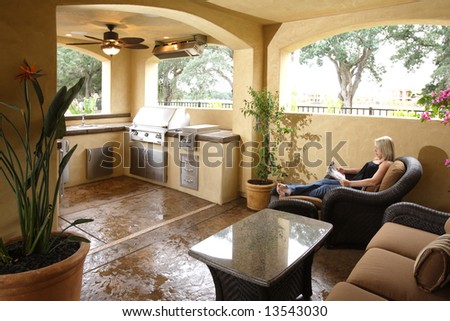A lounge area in a new luxury backyard
