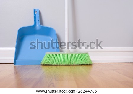 Spring Cleaning broom against wall