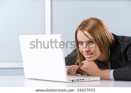 Business woman laptop in modern office