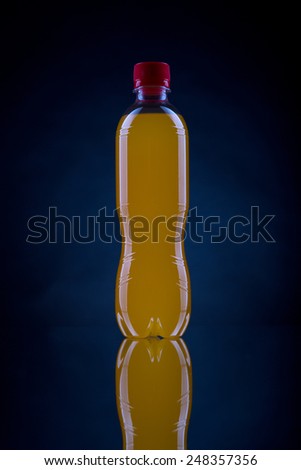 Small water bottle over  black  background