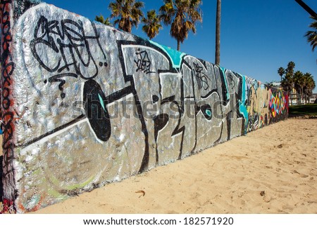 VENICE, CA -  NOVEMBER 26, 2011 : The Venice Art Walls are located on the sand in Venice Beach. Artists with a valid permit are invited to express themselves and paint on the walls.
