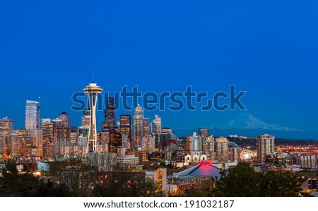 Seattle downtown skyline and Mt. Rainier at night, WA from Kerry park