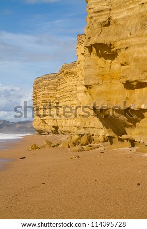 Sandstone cliffs at Burton Bradstock beach in West Dorset, England.  Situated just inland from Chesil Beach and near Bridport, it lies on Dorset\'s Jurassic Coast.