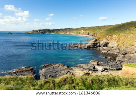 Kenneggy Sand Cornwall England west of Praa Sands and Penzance on the South West Coastal Path with blue sky and sea on a sunny day